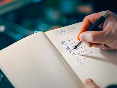 Handwritten notes and a timer for exercise tracking