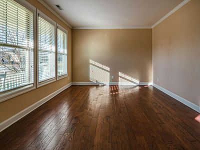 Minimalist room with large window and natural light